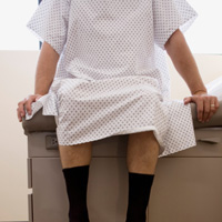 man on examining table