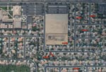 Thumbnail of Aerial photograph of a representative Bakersfield, California, neighborhood taken during August 2007. Red arrows indicate neglected or green swimming pools. Letters (F, G, H, J) are photographic reference points.