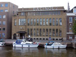 Thumbnail of Bacinol 2, building named in honor of the site of efforts in the Netherlands to produce penicillin during World War II and the drug produced by the Netherlands Yeast and Spirit Factory in Delft. Bacinol was a code name for penicillin. Source: https://commons.wikimedia.org/wiki/File:Delft_-_Gevel_Bacinol_2.jpg 