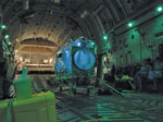 Thumbnail of A single Trexler Air Transportable Isolator patient transport system ready for use on a Boeing C-17 Globemaster transport aircraft.