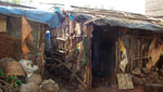 Thumbnail of Typical boarding house in Bahir Dah, Ethiopia, in which many day laborers sleep at night during the heavy rainy season (June–September; Table) because it is too wet to sleep outdoors. At other times of the year when it does not rain so heavily and so often, day laborers in Bahir Dah tend to sleep outdoors and, thus, do not have to pay for lodging in boarding houses. Image courtesy of S.C. Barker.