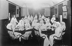 Archival photo of Juneau Chapter of the Red Cross from study of nonpharmaceutical interventions during 1918–1920 influenza pandemic, Alaska, USA. During the pandemic, the Red Cross made cloth mask and distributed to populations in Alaska. However, their reach was limited. Source: Library of Congress (https://www.loc.gov/resource/anrc.06015).