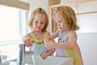 girls washing hands