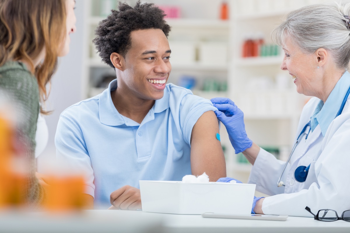 man getting a flu shot