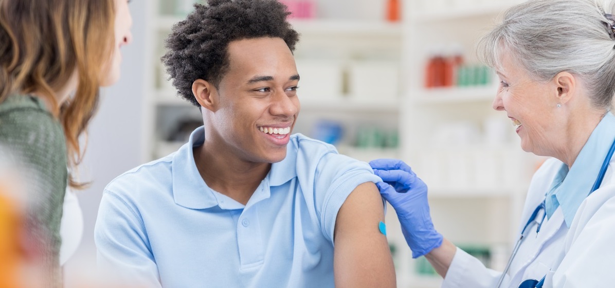 man getting a flu shot