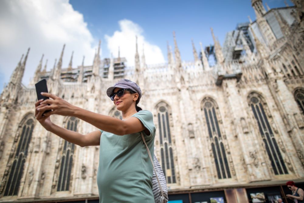 pregnant traveler taking selfie